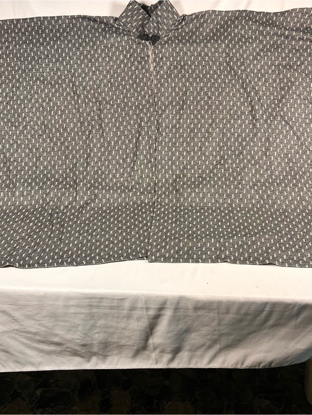 Grey patterned poncho